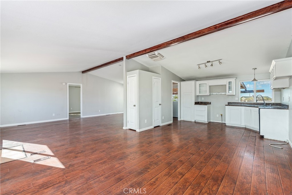 6320 Cholame Road Phelan, CA 92371 - Photo 10 of 33 a view of a kitchen with wooden floor and a kitchen
