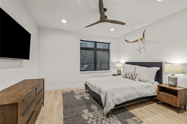 a bedroom with a bed and a walk in closet