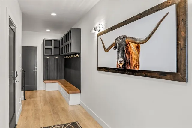 a view of a roof deck with furniture