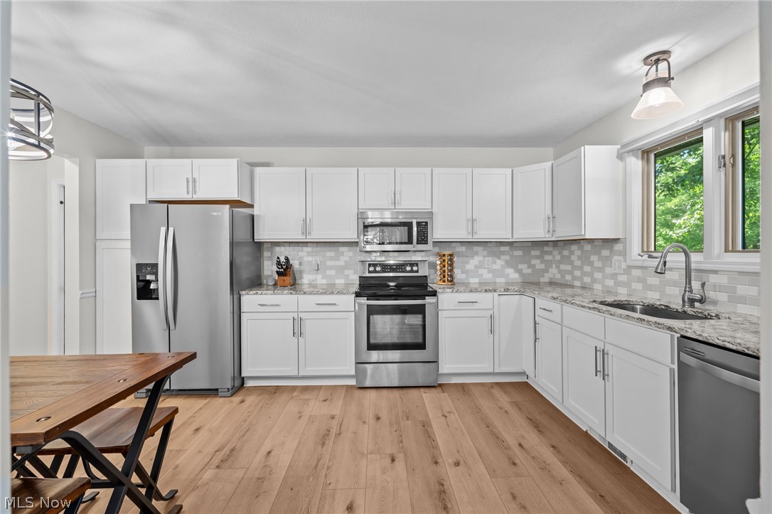 73 Lethbridge Lane Akron, OH 44321 - Photo 11 of 44 Well-appointed Eat-in Kitchen boasts...