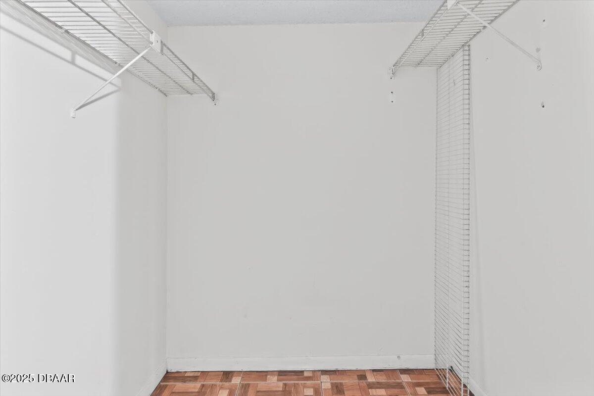 640 North Nova Road, Unit 114 Ormond Beach, FL 32174 - Photo 12 of 40 a view of small space with racks on the wall