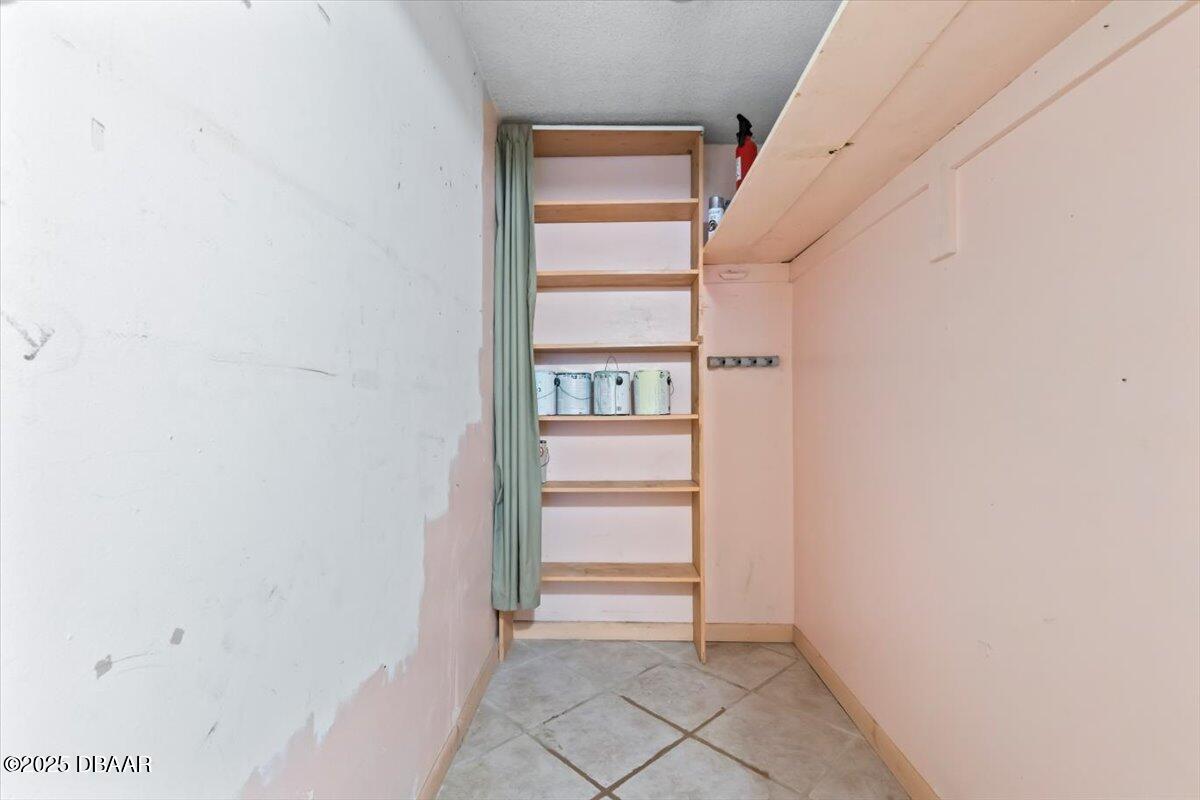 640 North Nova Road, Unit 114 Ormond Beach, FL 32174 - Photo 13 of 40 a view of an empty walk in closet
