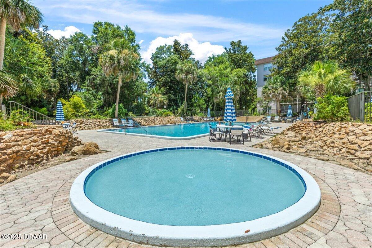 640 North Nova Road, Unit 114 Ormond Beach, FL 32174 - Photo 29 of 40 a view of outdoor space and swimming pool