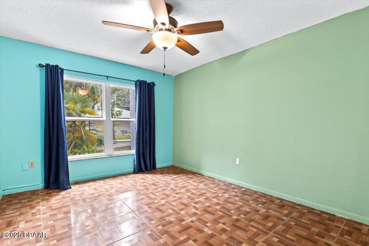 640 North Nova Road, Unit 114 Ormond Beach, FL 32174 - Photo 8 of 40 a view of an empty room with a window