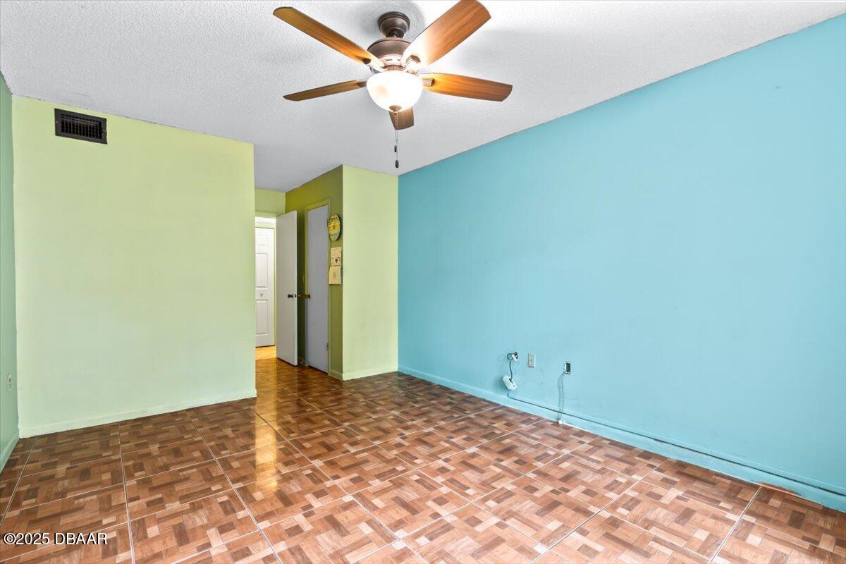 640 North Nova Road, Unit 114 Ormond Beach, FL 32174 - Photo 10 of 40 a view of a big room with carpet