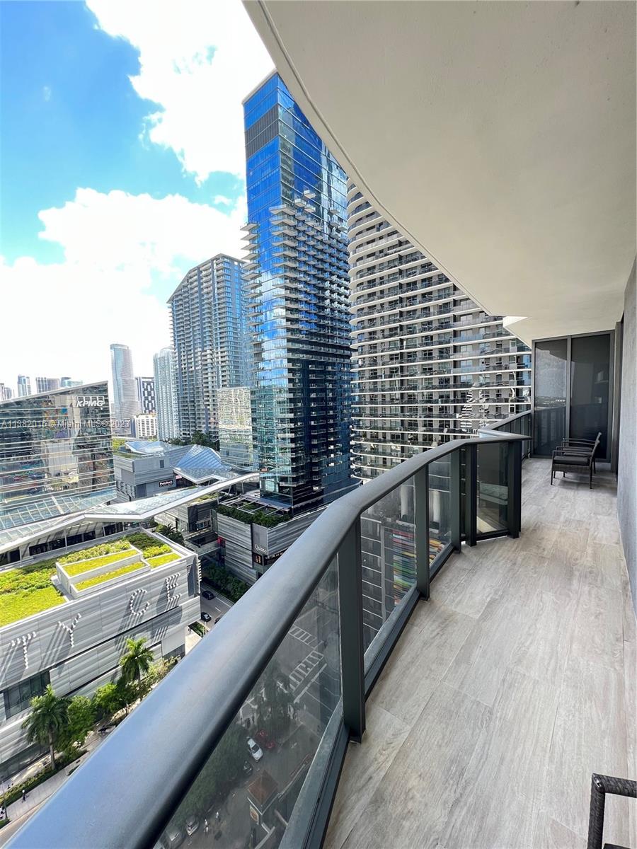 45 Southwest 9th Street, Unit 1908 Miami, FL 33130 - Photo 32 of 51 a view of swimming pool with outdoor seating and city view