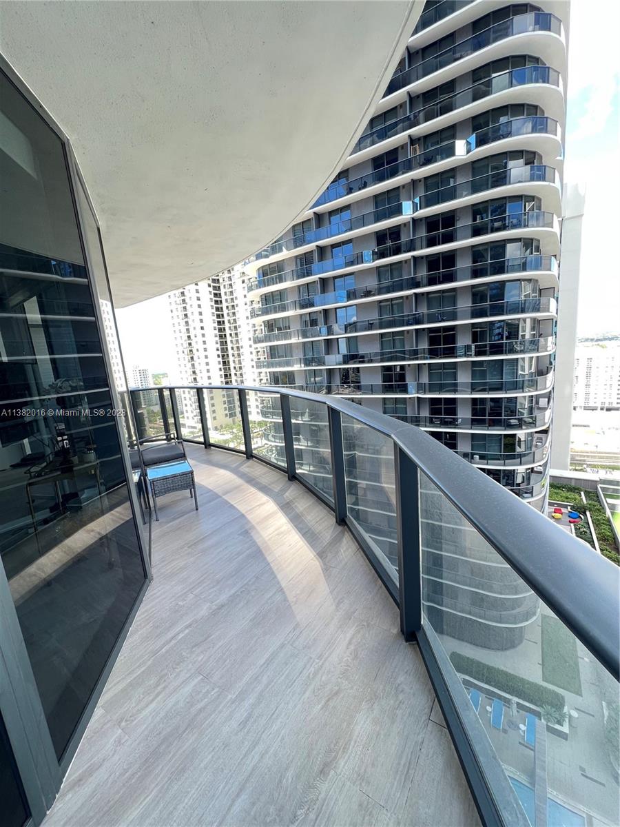 45 Southwest 9th Street, Unit 1908 Miami, FL 33130 - Photo 33 of 51 a view of a balcony with chairs