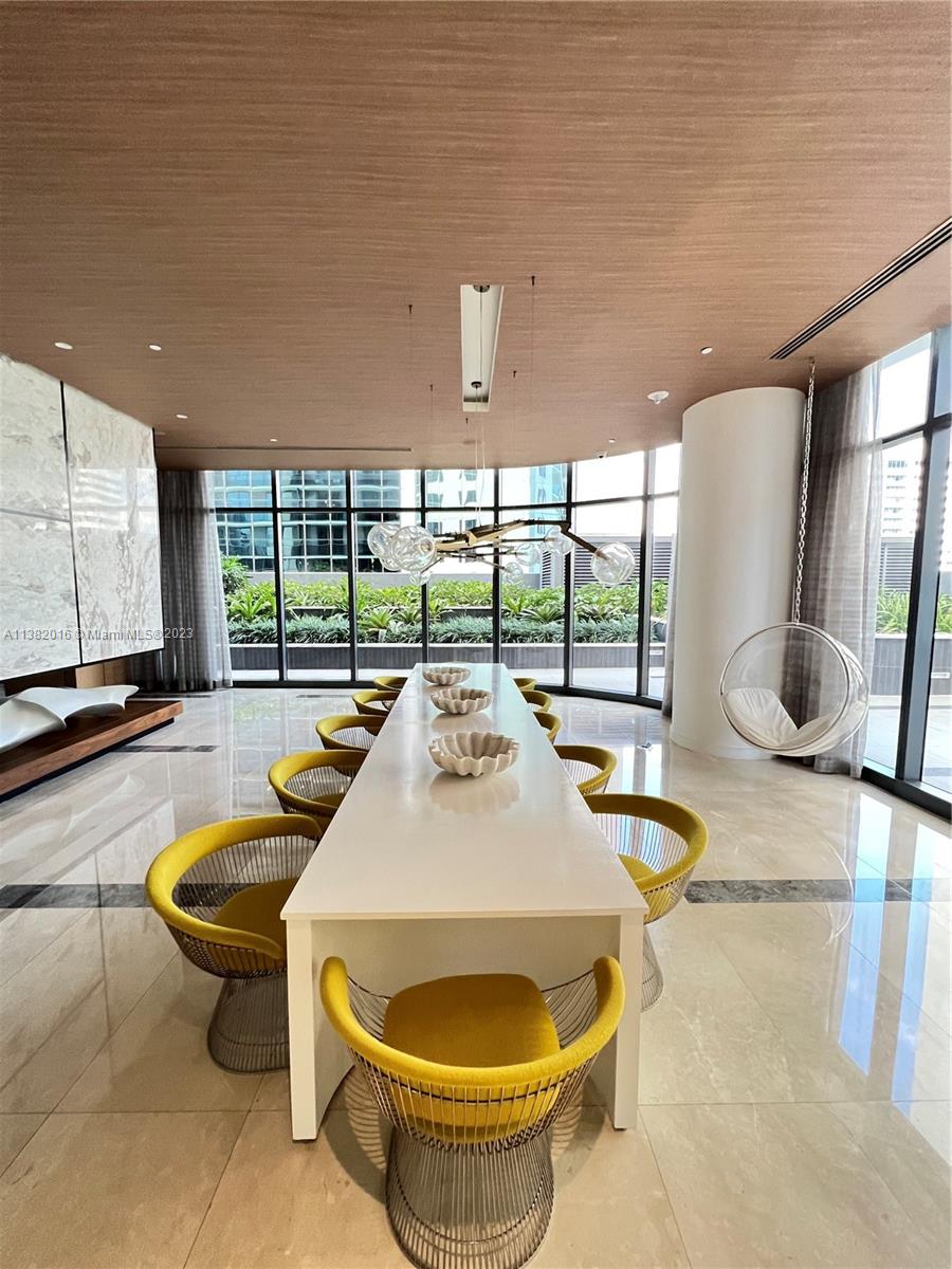 45 Southwest 9th Street, Unit 1908 Miami, FL 33130 - Photo 50 of 51 a outdoor space with a large tub and couches