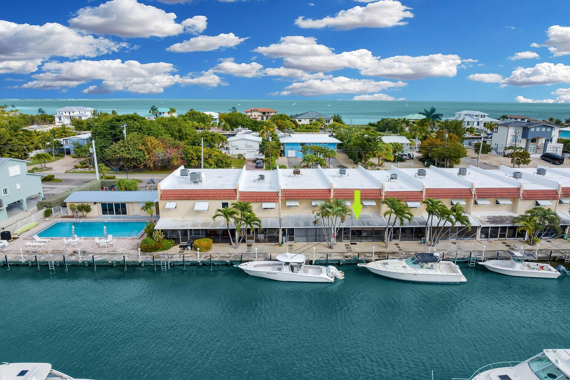 423 Sombrero Beach Road, Unit 9 Marathon, FL 33050 - Photo 2 of 42 Waterfront Pool & Canal View