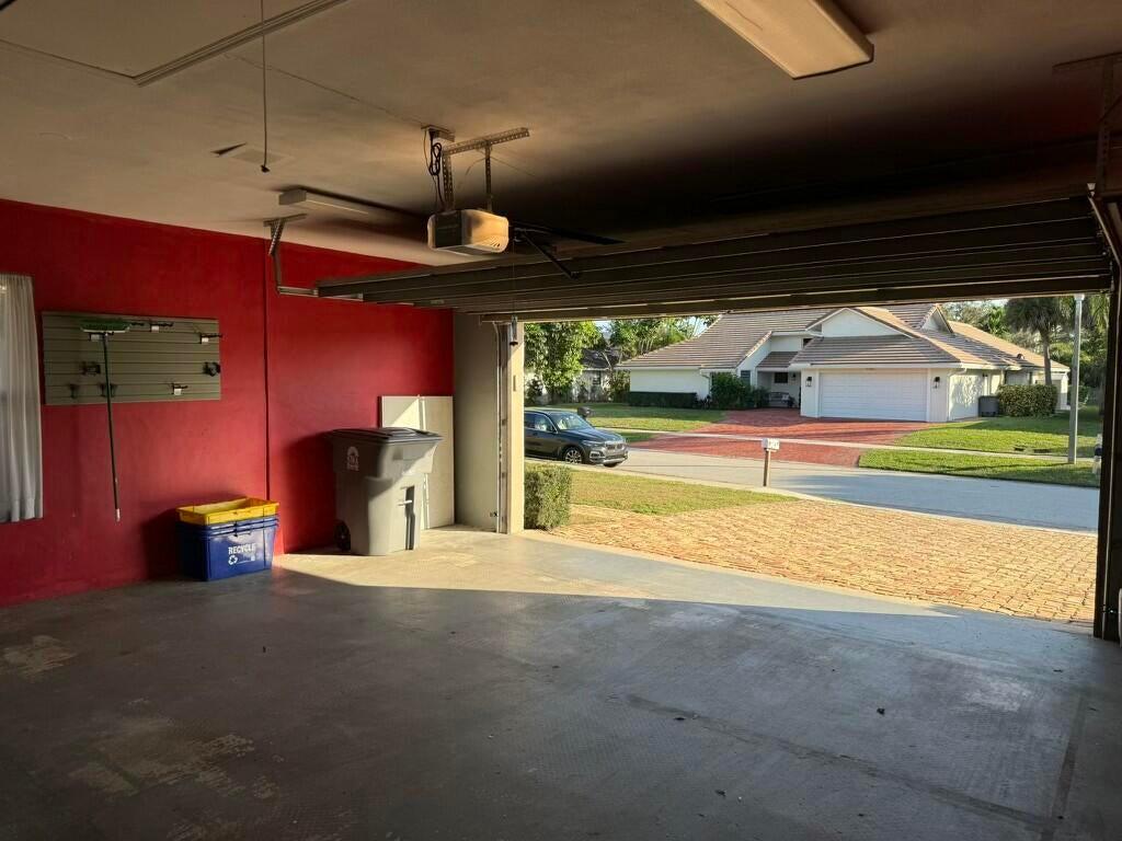 5777 Wind Drift Lane Boca Raton, FL 33433 - Photo 14 of 15 a view of an empty room with a fireplace