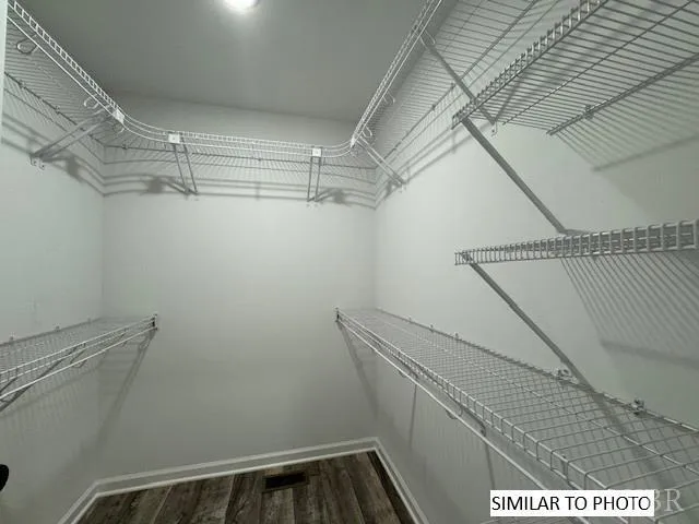 a view of a room with racks on the wall