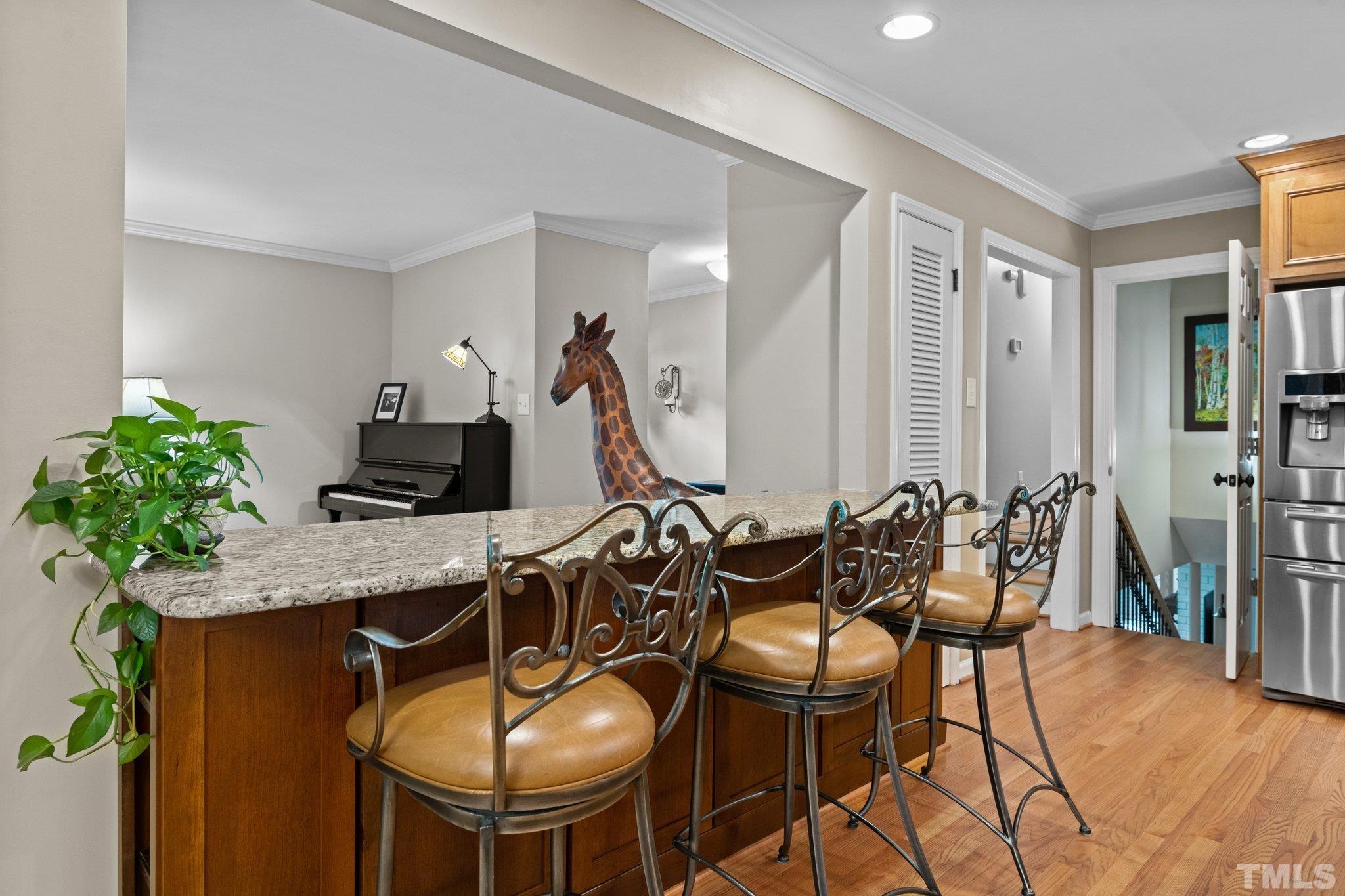 4116 Spruce Drive Raleigh, NC 27612 - Photo 16 of 51 a view of a livingroom with furniture and a table
