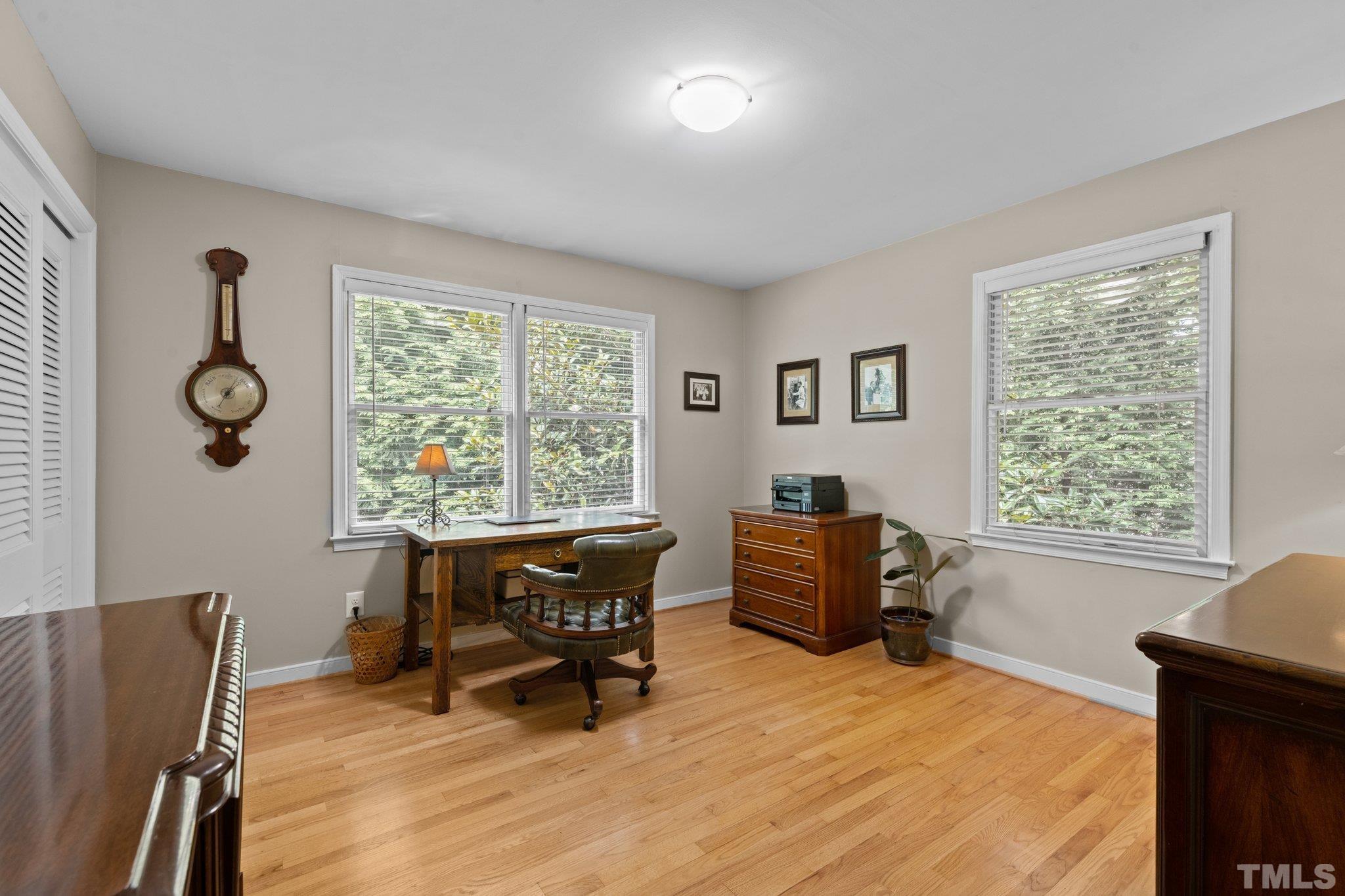 4116 Spruce Drive Raleigh, NC 27612 - Photo 28 of 51 a living room with furniture and a window