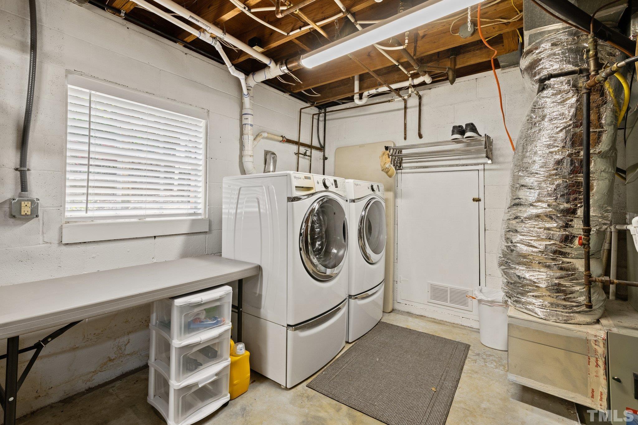 4116 Spruce Drive Raleigh, NC 27612 - Photo 29 of 51 a utility room with dryer and washer