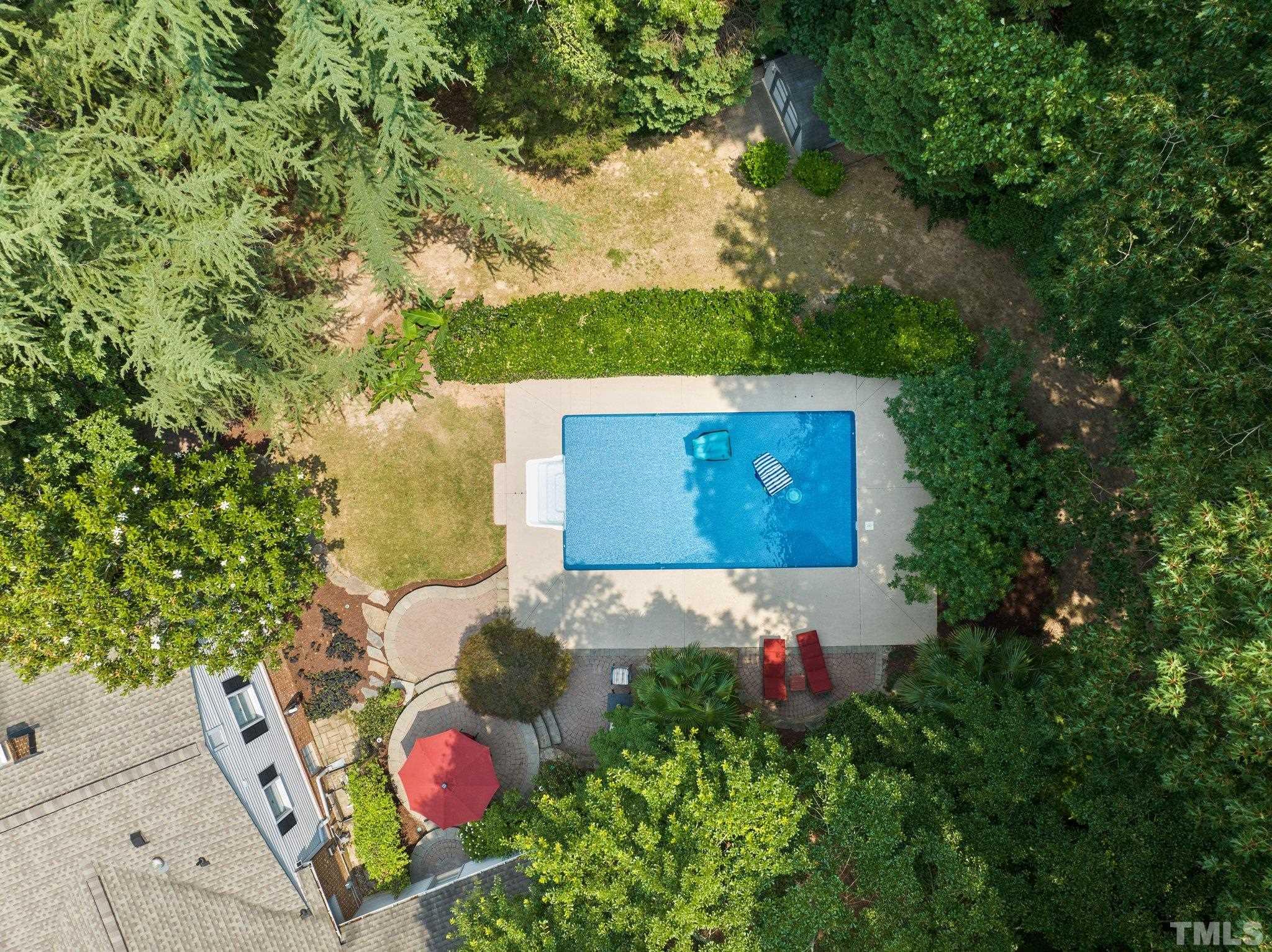 4116 Spruce Drive Raleigh, NC 27612 - Photo 41 of 51 a view of an outdoor space and a yard