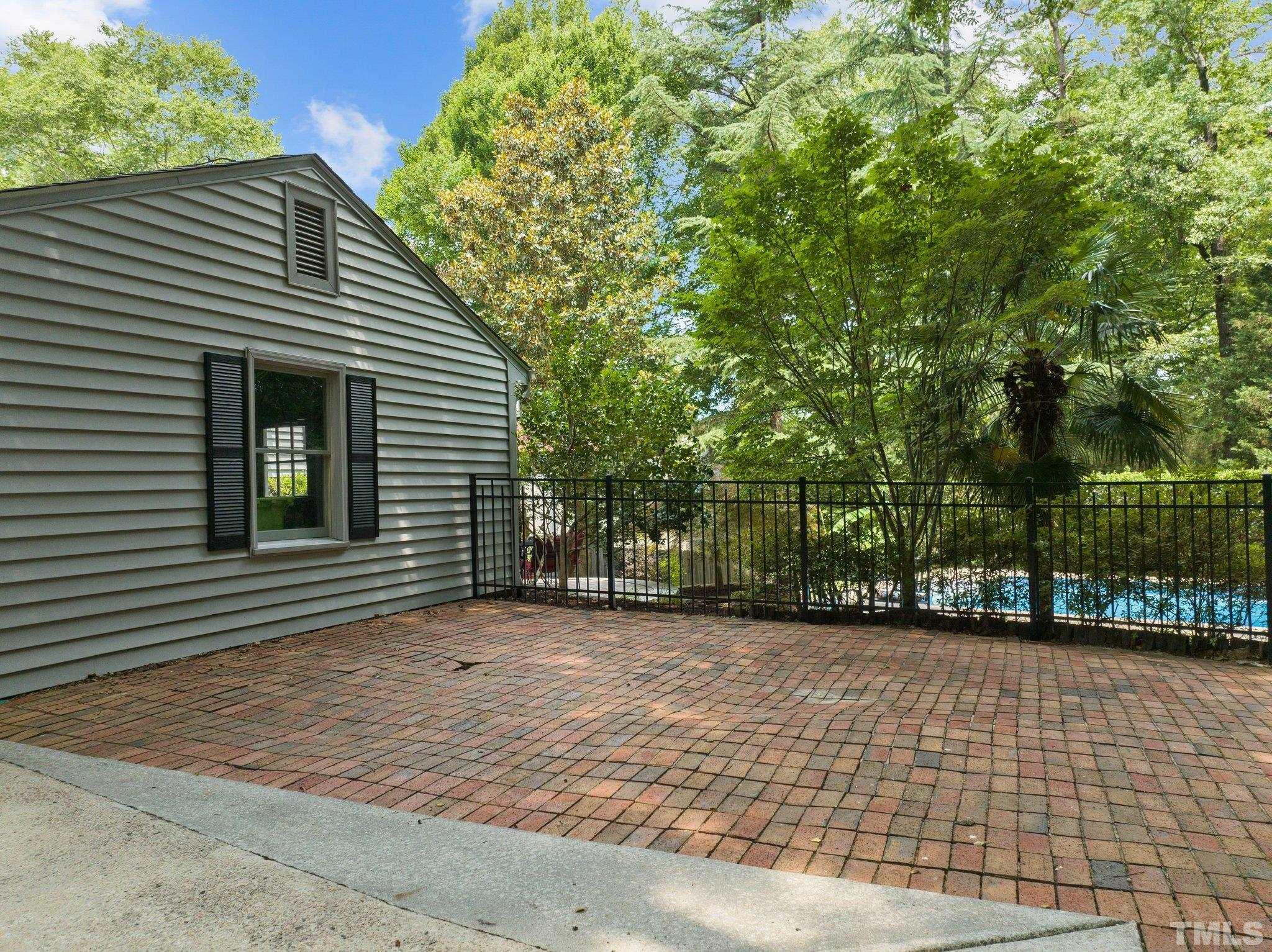4116 Spruce Drive Raleigh, NC 27612 - Photo 49 of 51 a view of a house with a backyard