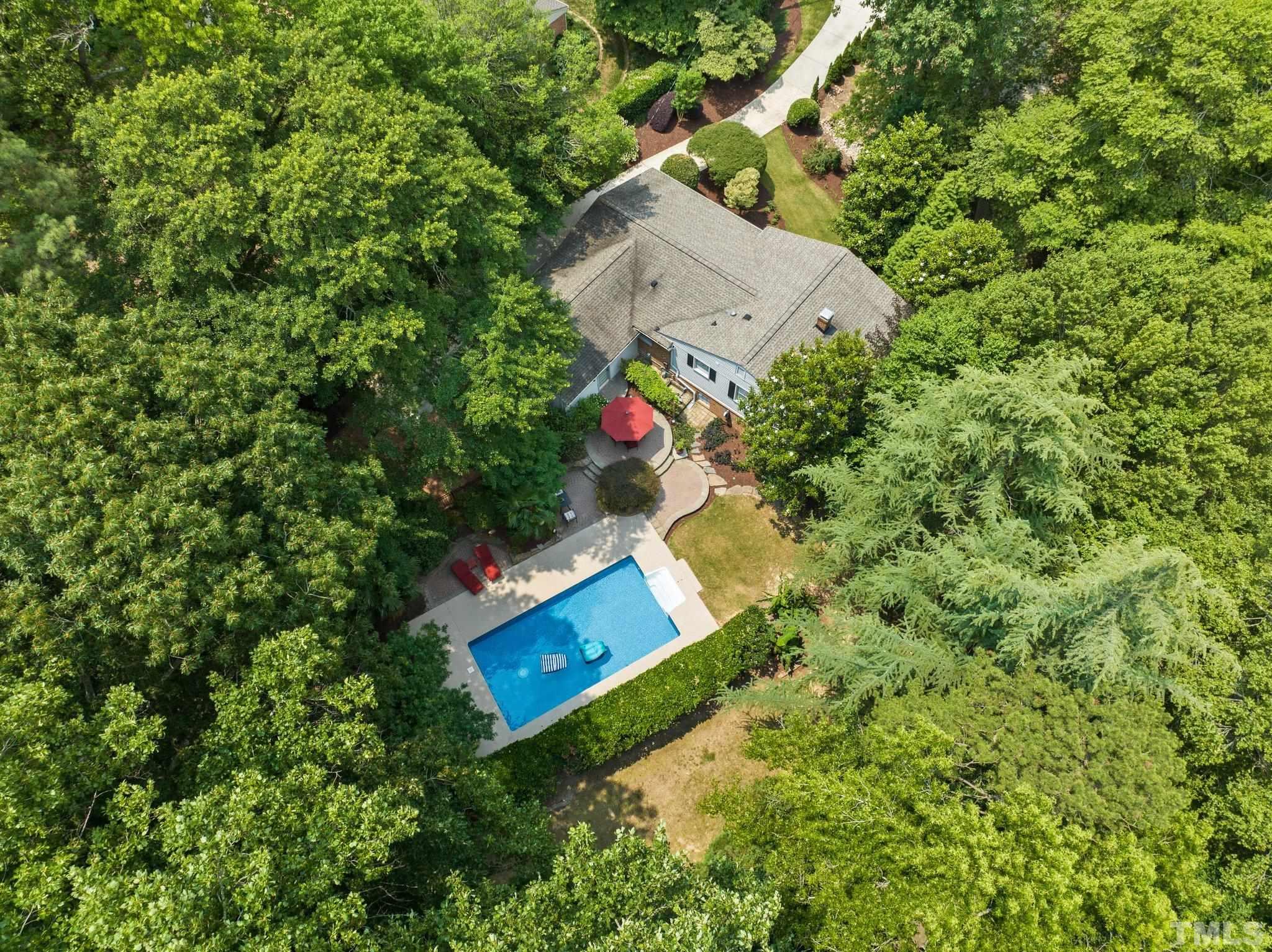 4116 Spruce Drive Raleigh, NC 27612 - Photo 50 of 51 an aerial view of house with yard and swimming pool