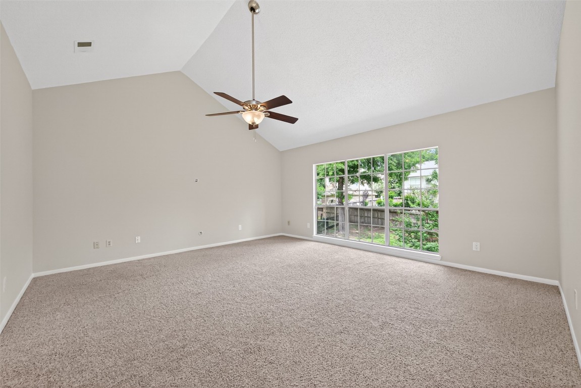 106 Breezy Point Place Spring, TX 77381 - Photo 22 of 37 Huge upstairs game room offers versatile space for entertainment or relaxation.