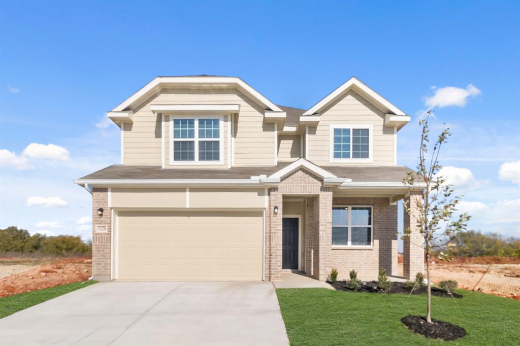 1128 Runway Road Fort Worth, TX 76131 - Photo 1 of 18 a front view of a house with a yard