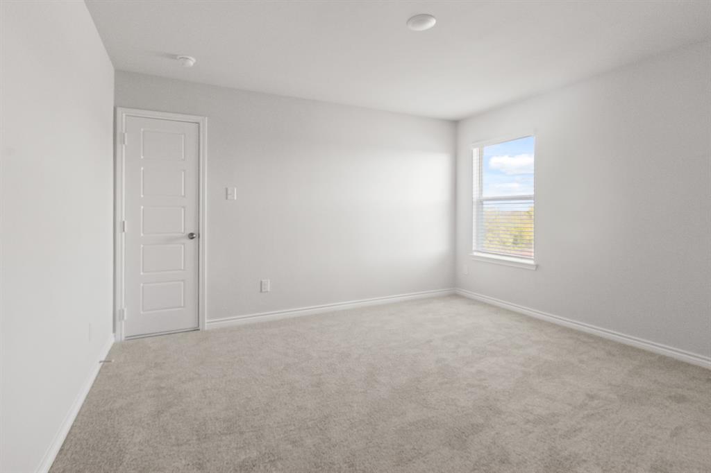 1128 Runway Road Fort Worth, TX 76131 - Photo 14 of 18 an empty room with windows
