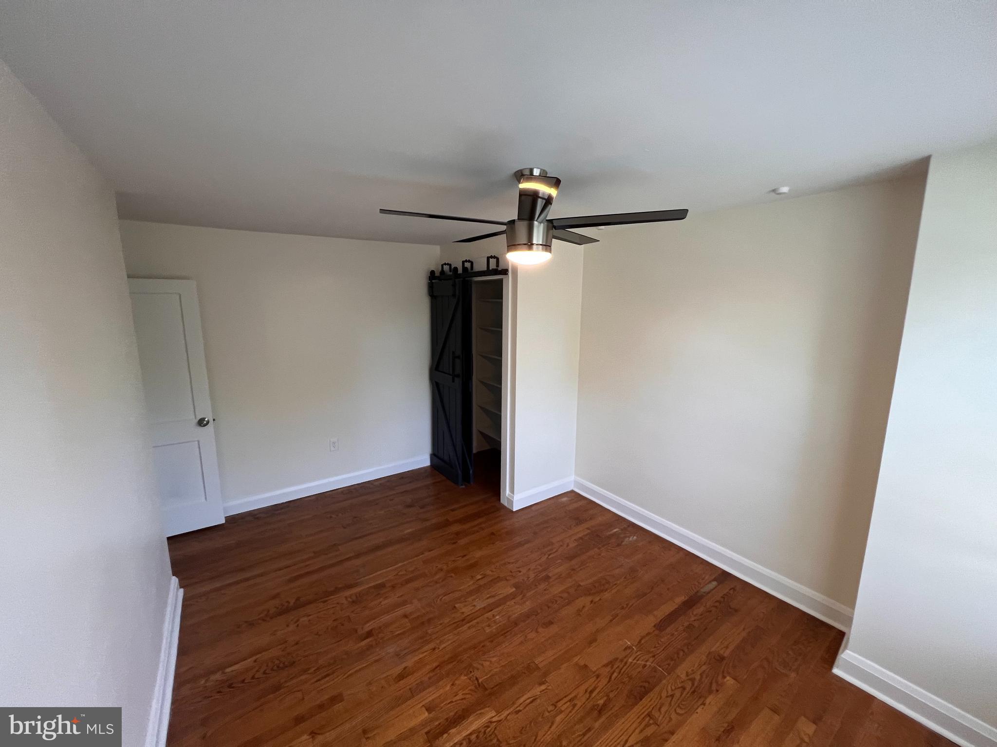 1583 Doxbury Road Towson, MD 21286 - Photo 12 of 31 a view of empty room with wooden floor