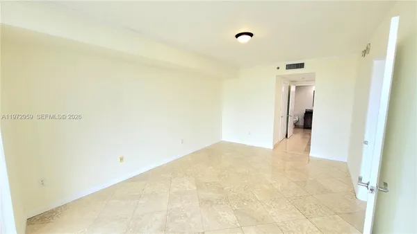 a view of a room with an empty space