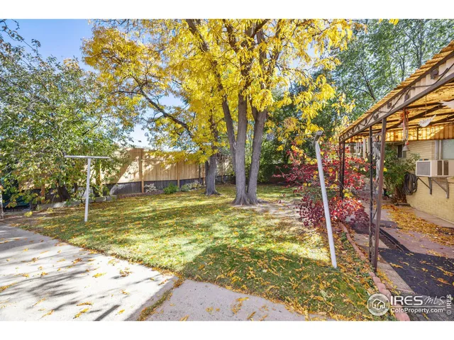 a view of swimming pool with a patio