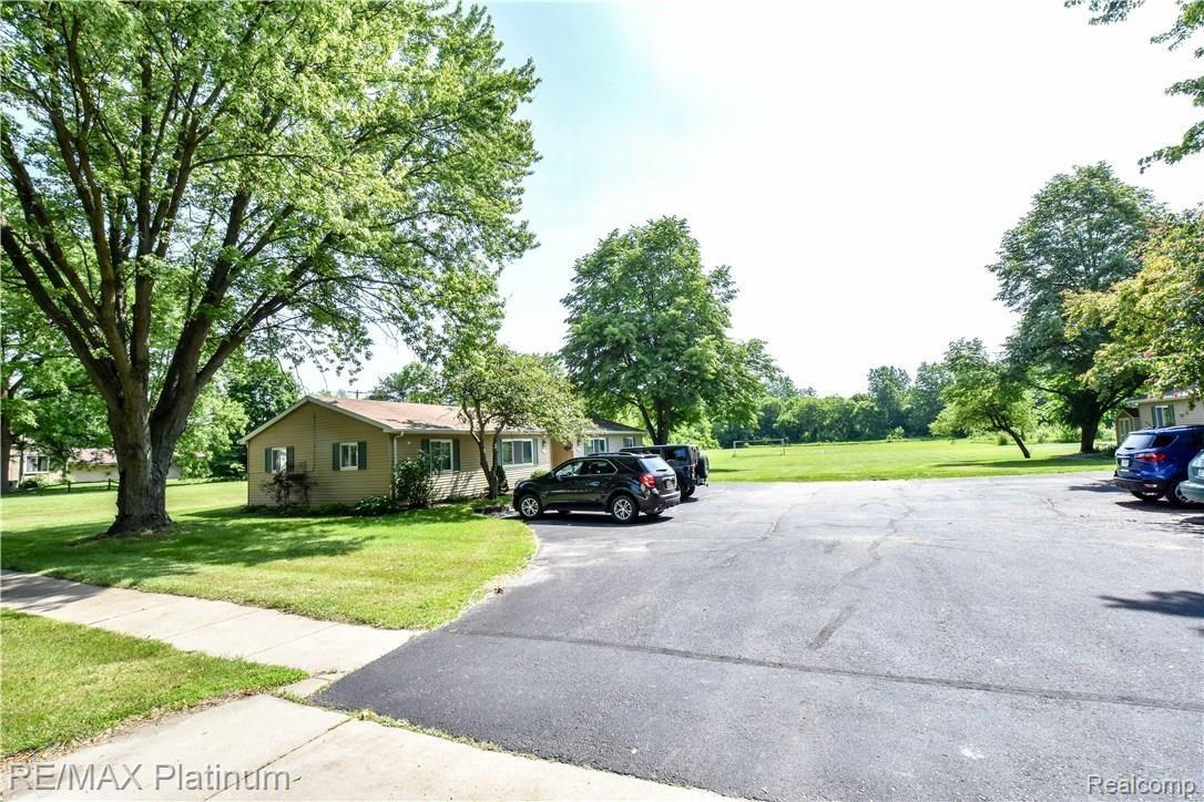 501 Fowler Street Howell, MI 48843 - Photo 5 of 27 Four Parking Spaces Per Duplex