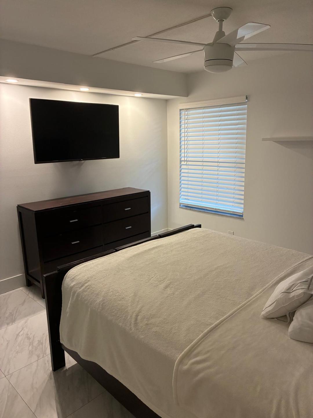 5749 Camino Del Sol, Unit 202 Boca Raton, FL 33433 - Photo 19 of 36 Guest bedroom