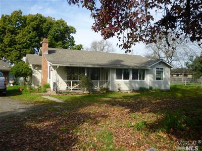 4571 Sebastopol Road Santa Rosa, CA 95401 - Photo 1 of 1 a front view of a house with a yard