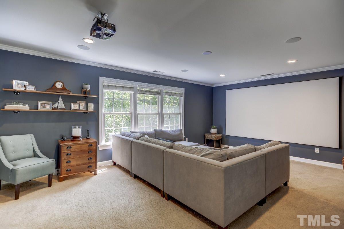 8401 Wapello Lane Raleigh, NC 27613 - Photo 21 of 26 a room with furniture and a window