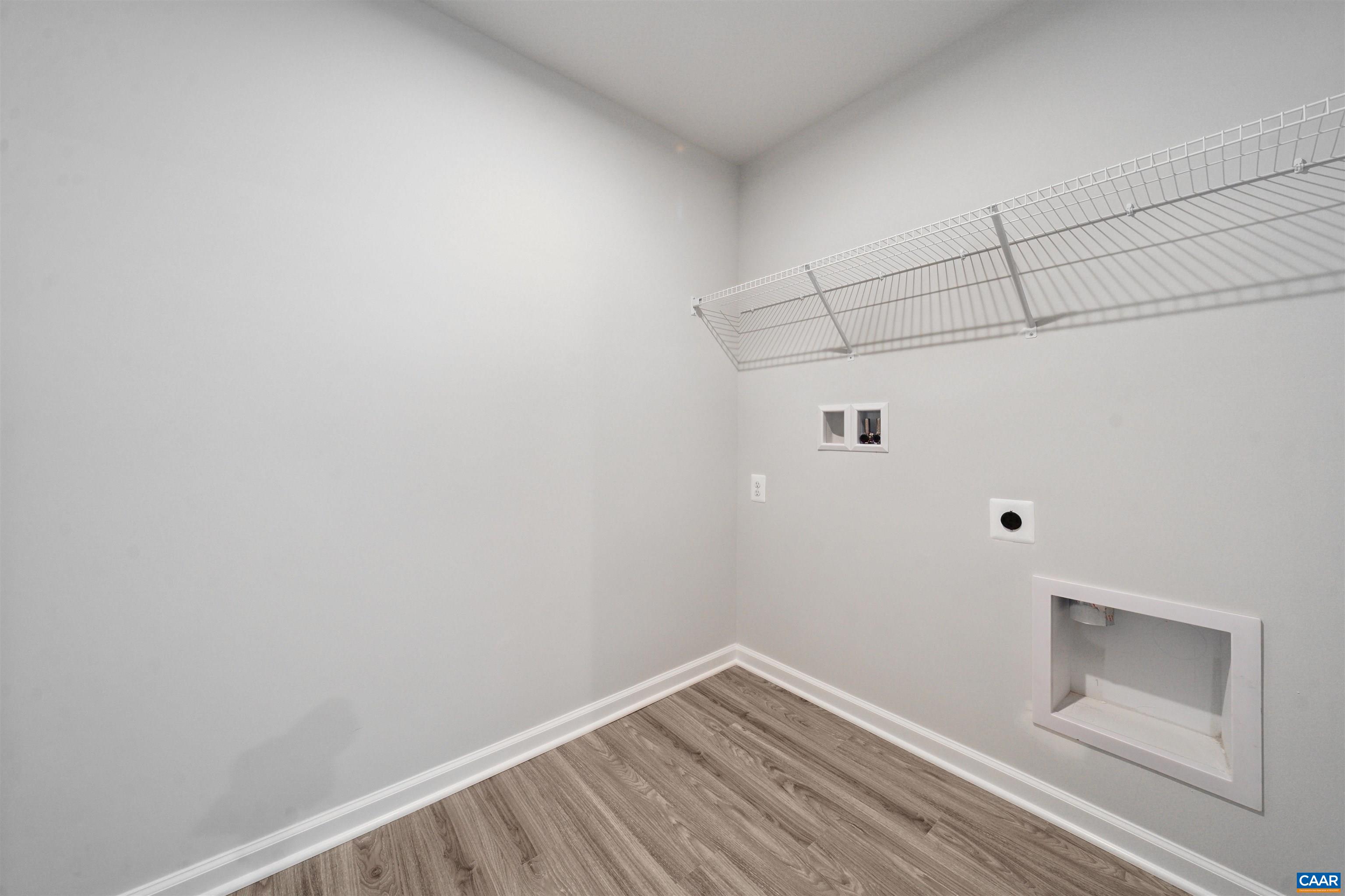 259 Trailfork Road Barboursville, VA 22923 - Photo 13 of 40 a view of a room with racks on the wall