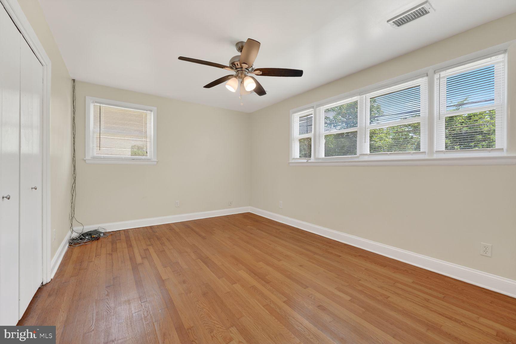 7205 Livingston Road Oxon Hill, MD 20745 - Photo 12 of 25 Bright and airy room with hardwood floors.