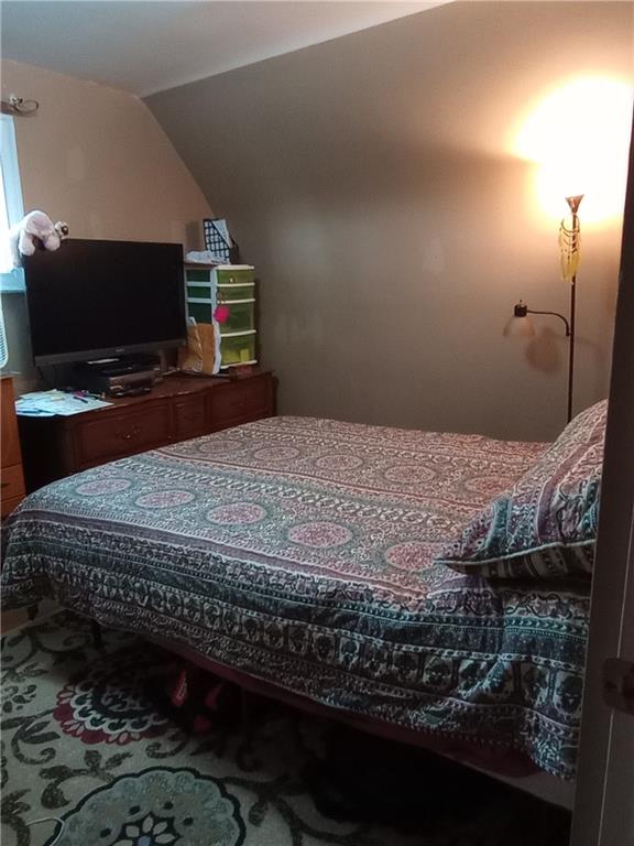 528 Longfellow Street Vandergrift, PA 15690 - Photo 11 of 23 a bedroom with a bed and a television