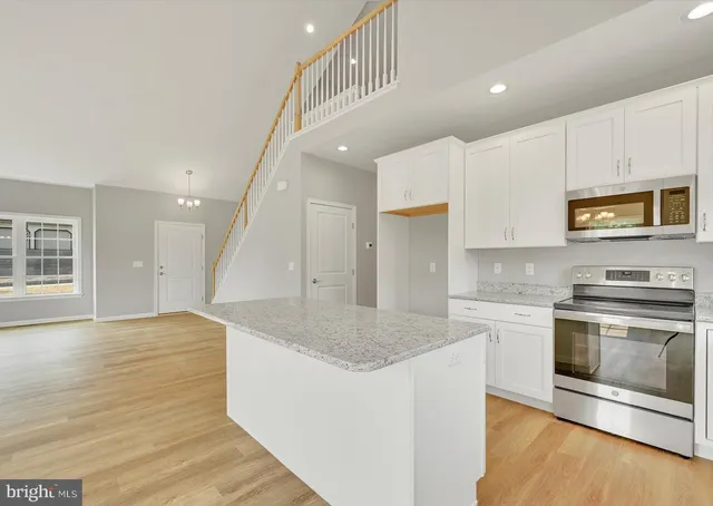 a bathroom with a sink a mirror and a toilet