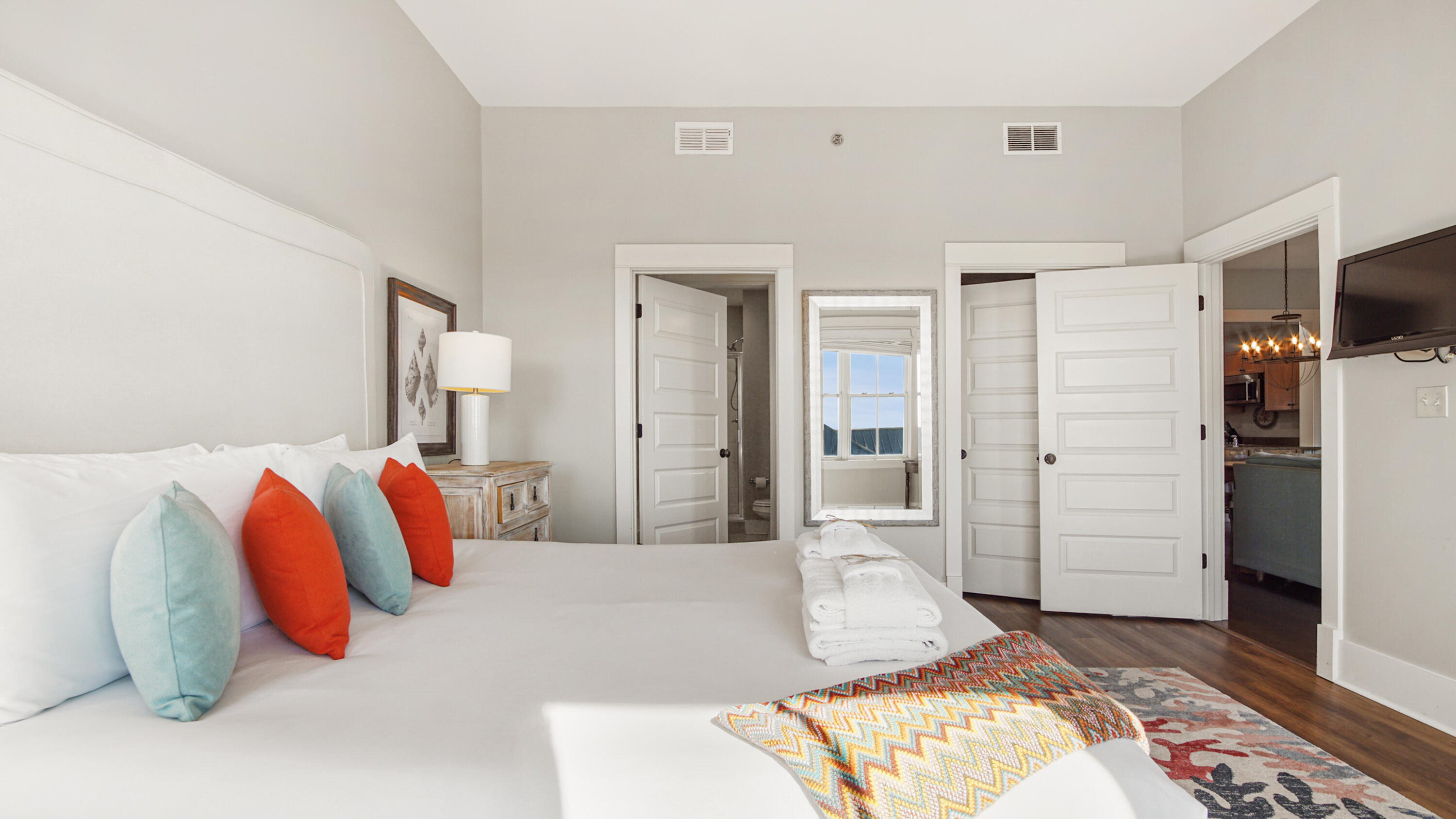 2050 West County Highway 30A, Unit M1408 Santa Rosa Beach, FL 32459 - Photo 16 of 25 a bedroom with a bed and a walk in closet