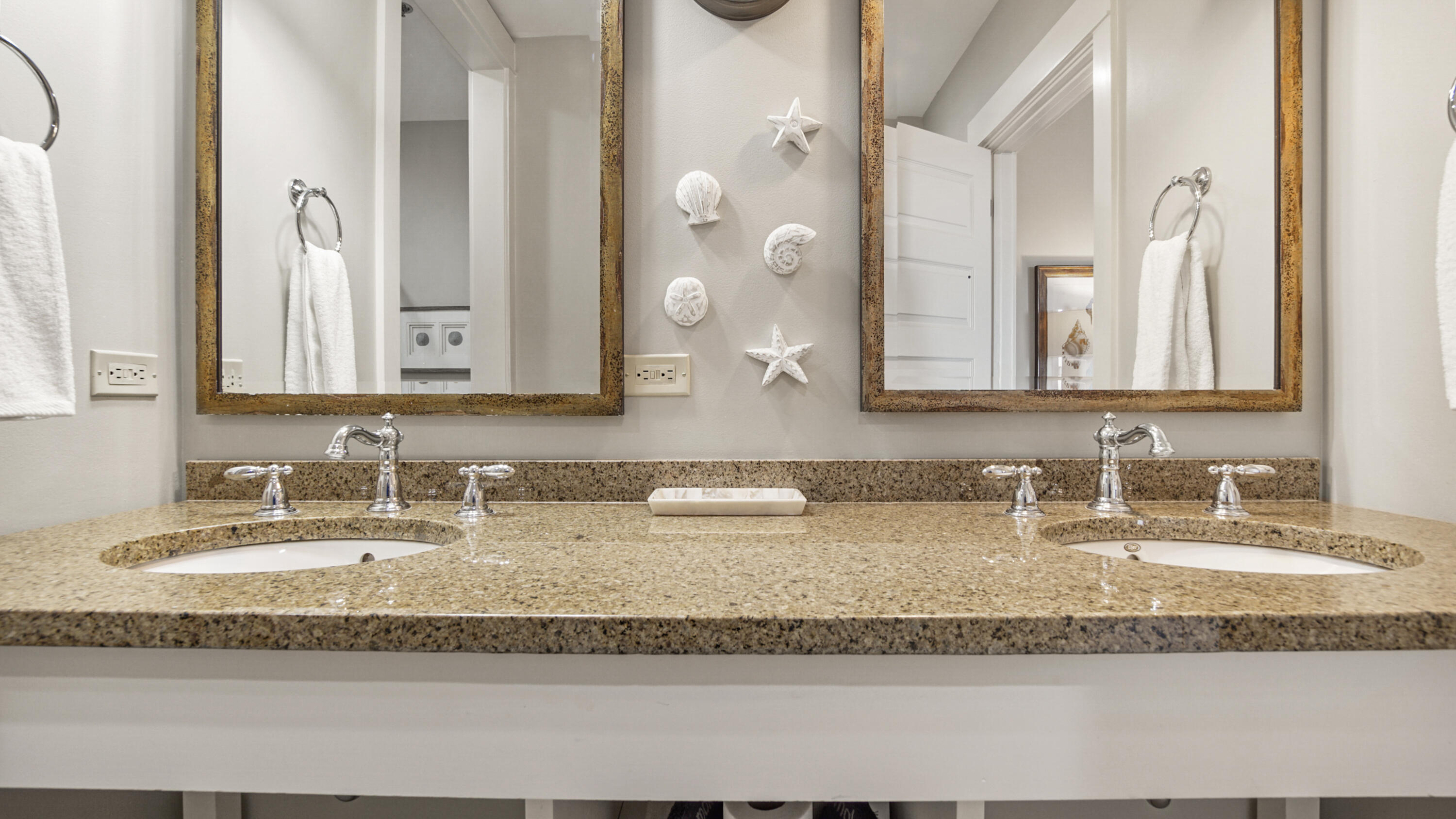 2050 West County Highway 30A, Unit M1408 Santa Rosa Beach, FL 32459 - Photo 18 of 25 a bathroom with mirror and double