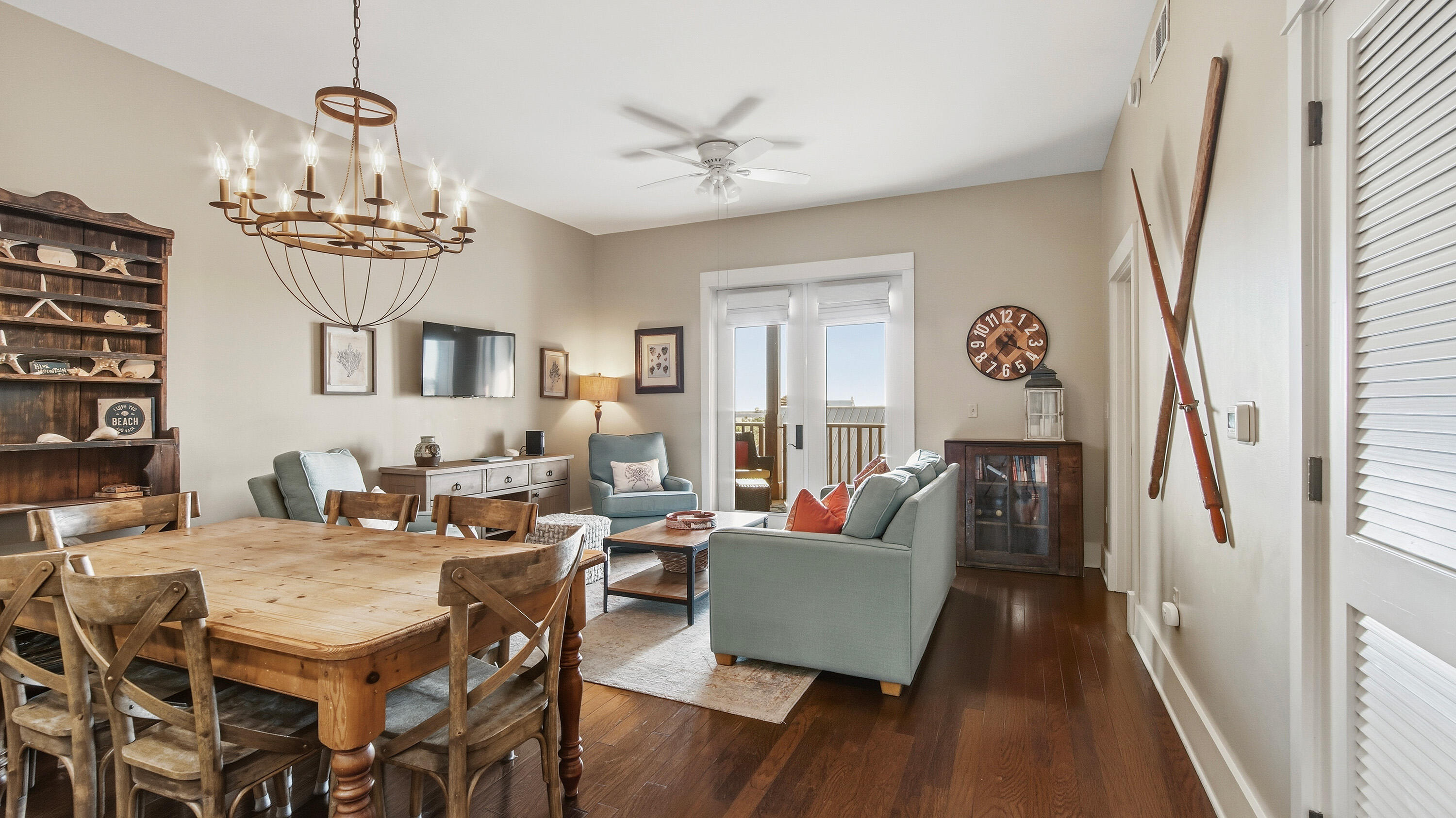 2050 West County Highway 30A, Unit M1408 Santa Rosa Beach, FL 32459 - Photo 8 of 25 a view of a dining room with furniture and wooden floor