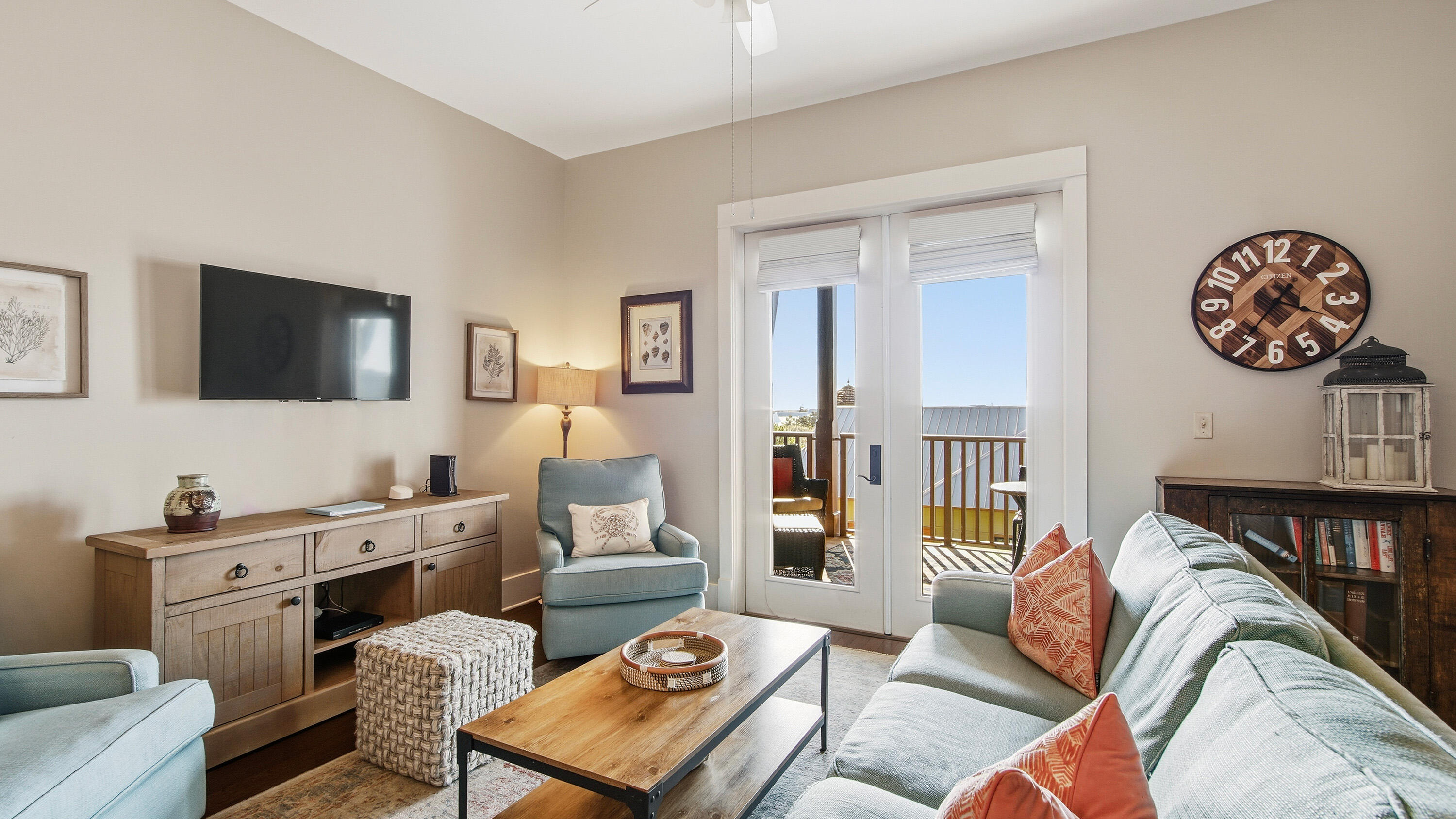 2050 West County Highway 30A, Unit M1408 Santa Rosa Beach, FL 32459 - Photo 9 of 25 a living room with furniture and a flat screen tv