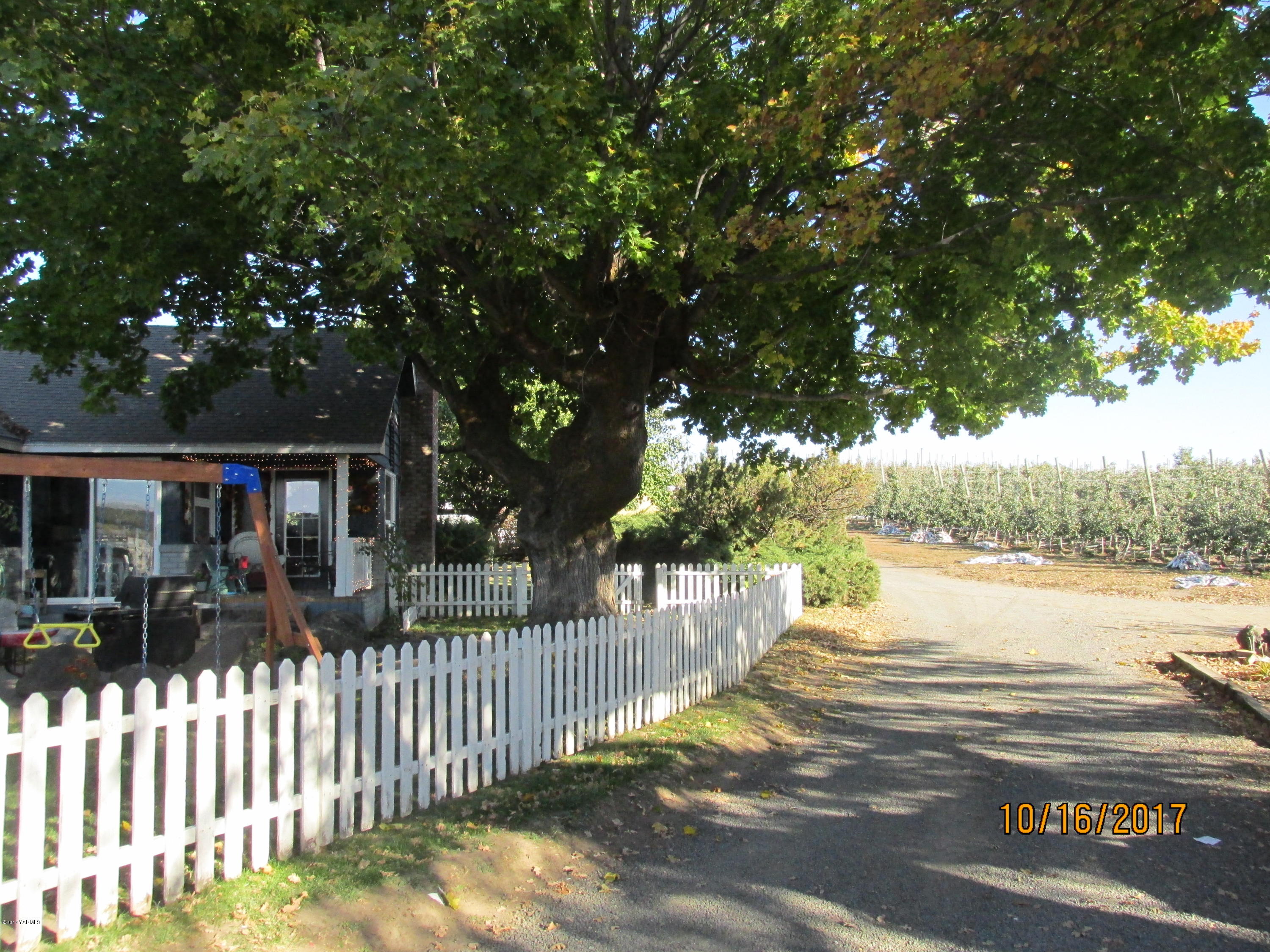 1172 North Cowiche Road Tieton, WA 98947 - Photo 2 of 46 a view of a house with wooden fence