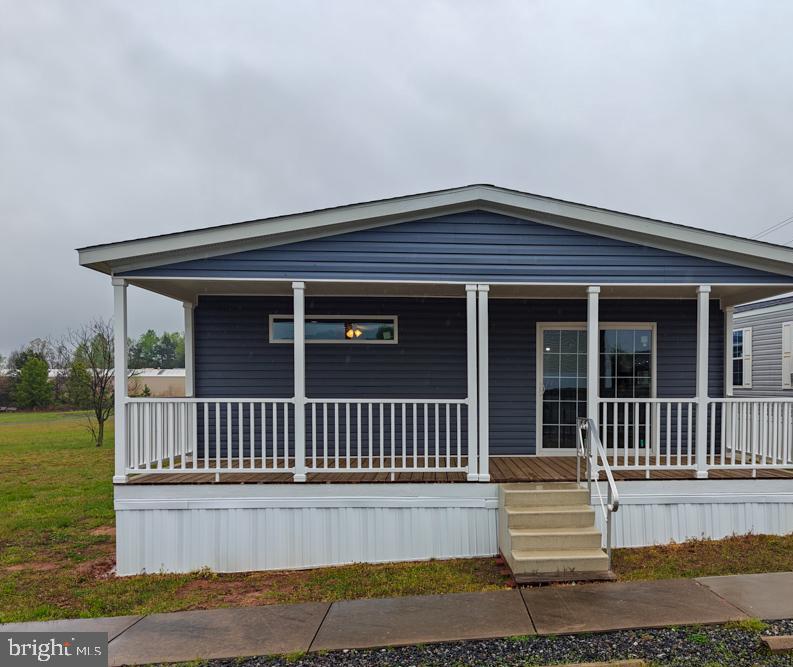 12623 Shell Mill Road, Unit 67 Bishopville, MD 21813 - Photo 1 of 22 a front view of a house