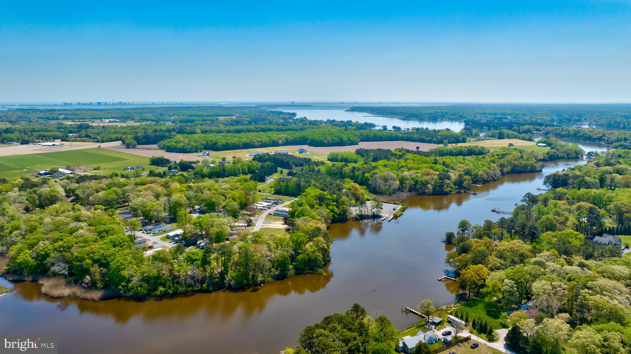 12623 Shell Mill Road, Unit 67 Bishopville, MD 21813 - Photo 22 of 22 an aerial view of a house with a lake view