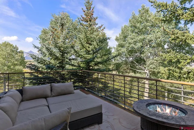 a view of a balcony with a couple of couches
