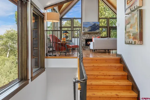 a room with patio entrance view and a floor to ceiling window