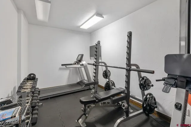 a view of a room with gym equipment