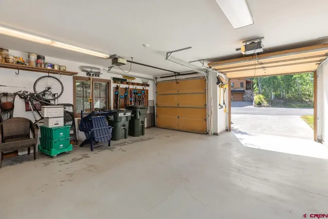 a view of a garage with storage