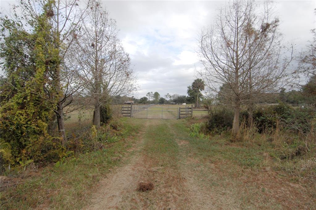 14780 Sugarbowl Road Myakka City, FL 34251 - Photo 46 of 53 a view of a lake with houses