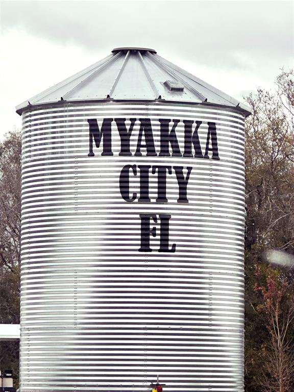 14780 Sugarbowl Road Myakka City, FL 34251 - Photo 5 of 53 a view of a large white building