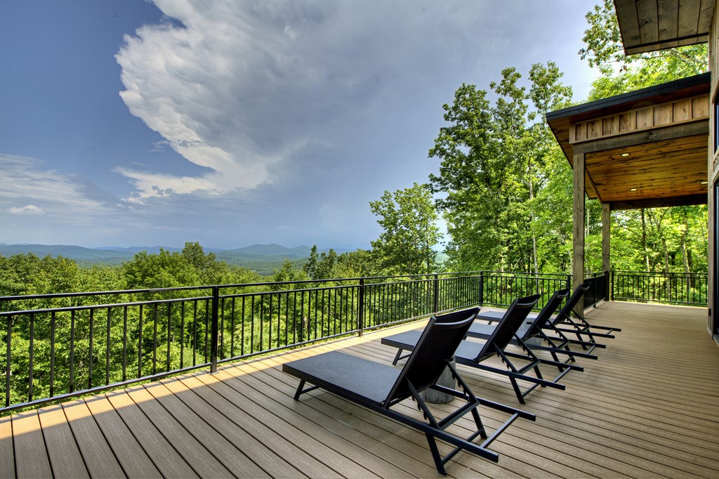 417 Bill Claypool Drive Blue Ridge, GA 30513 - Photo 21 of 73 a view of a chairs on the roof deck