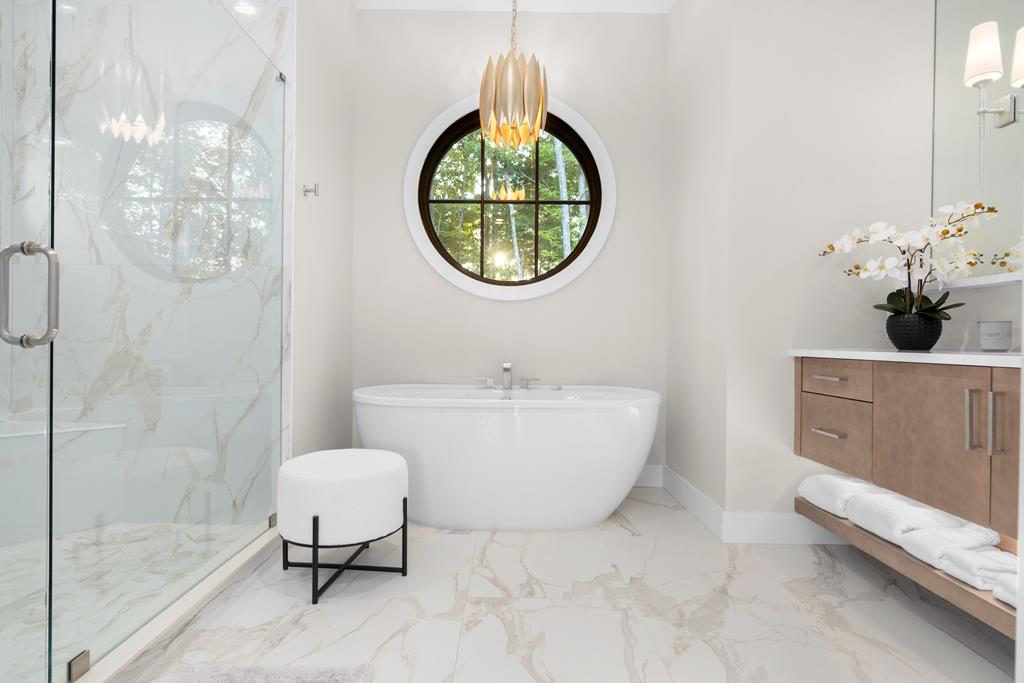 417 Bill Claypool Drive Blue Ridge, GA 30513 - Photo 27 of 73 a bathroom with a sink a toilet and a mirror